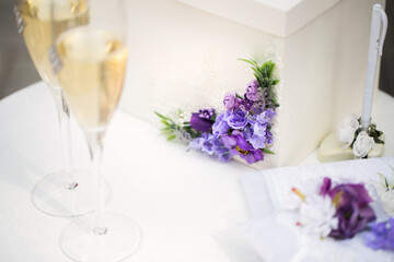 Wedding glasses with champagne on the table