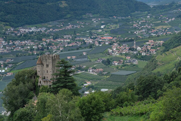 View of Fontana medieval castle above Merano as seen from the Apple Orchards trail above the town, Merano, South Tyrol, Italy.