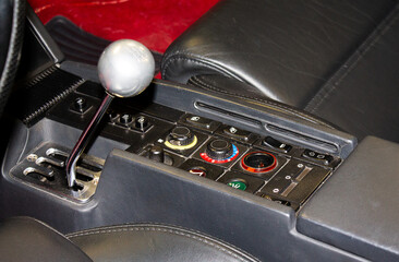 The shifting gate typical of this sports car of the brand with the jumping horse. Here also with...