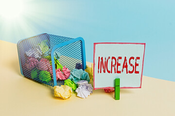Word writing text Increase. Business photo showcasing the act of getting bigger or better or of making something bigger Trash bin crumpled paper clothespin empty reminder office supplies tipped