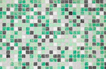 Mosaic wall texture in green and emerald colors