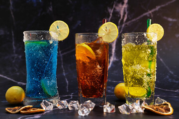 Cool drinks and summer alcoholic cocktail on wood table, space for text