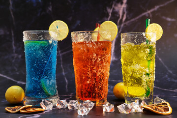 Cool drinks and summer alcoholic cocktail on wood table, space for text