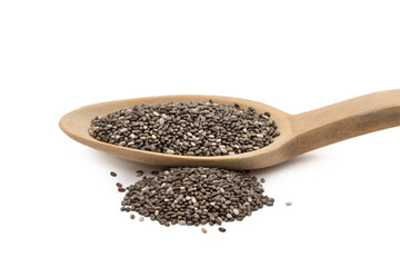 Close up of chia seeds on a wooden spoon with a pile next to it seen from the side and isolated on white background