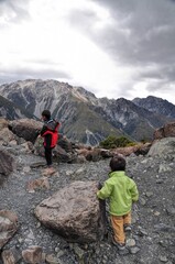 Two asian boys go hiking in Mount Cook, New Zealand