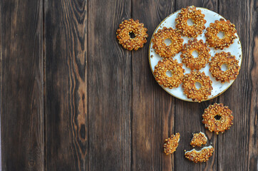 Homemade cookies or rings with crushed peanuts. Flour product