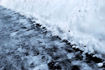 Winter street with snow and ice