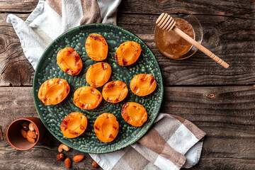 Summer dessert, Cooking Ripe peaches on the table close-up. Homemade bbq roasted peaches or nectarines, banner, catering menu recipe place for text, top view