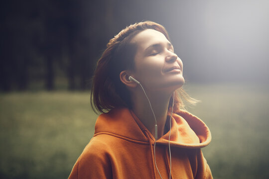 Young pretty girl with earphones
