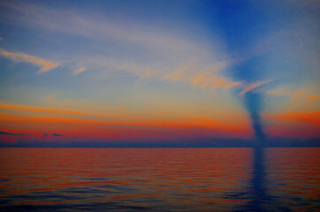 Fototapeta na wymiar sunset over the sea orange and blue