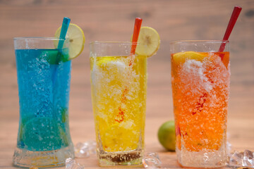 Alcoholic cocktail and non alcoholic cocktail on table. Summer cold drinks with lime, Variety of seasonal cocktails 