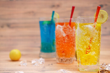 Cocktail on wooden background and space for text 