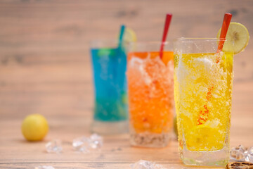 Cocktail on wooden background and space for text 