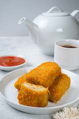 Delicious Risoles or Risol Mayo is a typical Indonesian traditional street food made from flour skin, meat and vegetables stuffing inside with mayonnaise and chili sauce.