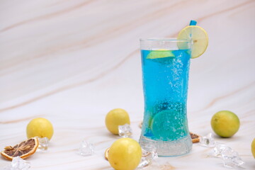 Refreshing summer drinks with alcohol on table background and cool drinks with lemonade, space for text