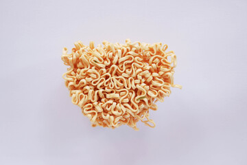 Fototapeta premium top view of Instant noodles on white background