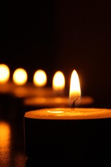 Candle is an ignitable wick embedded in wax, or another flammable solid substance such as tallow, that provides light, and in some cases, a fragrance. 