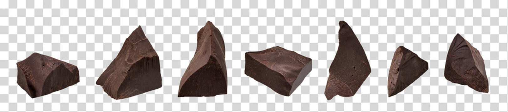 Cracked chocolates / broken chocolate chips or chocolate parts from top view on isolated background	