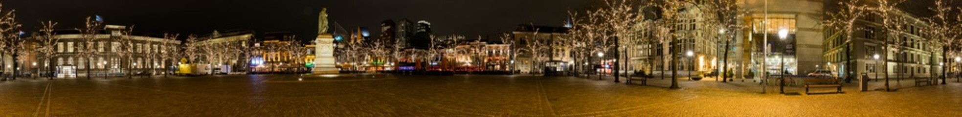 The Hague main square by night in winter panorama with statue of Willem of Orange and Dutch...