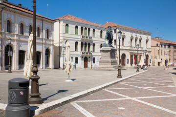 Italian city of Rovigo with empty Garibaldi square in a sunny summer day