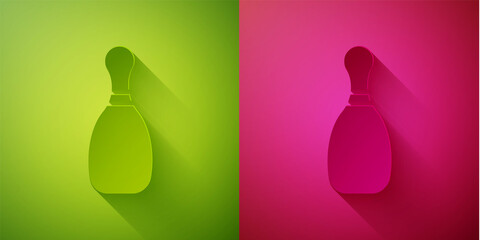 Paper cut Bowling pin icon isolated on green and pink background. Paper art style. Vector Illustration.