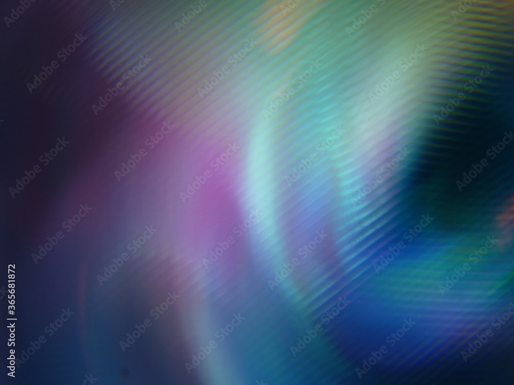 Poster mottled rotating abstract background with colorful light beams
