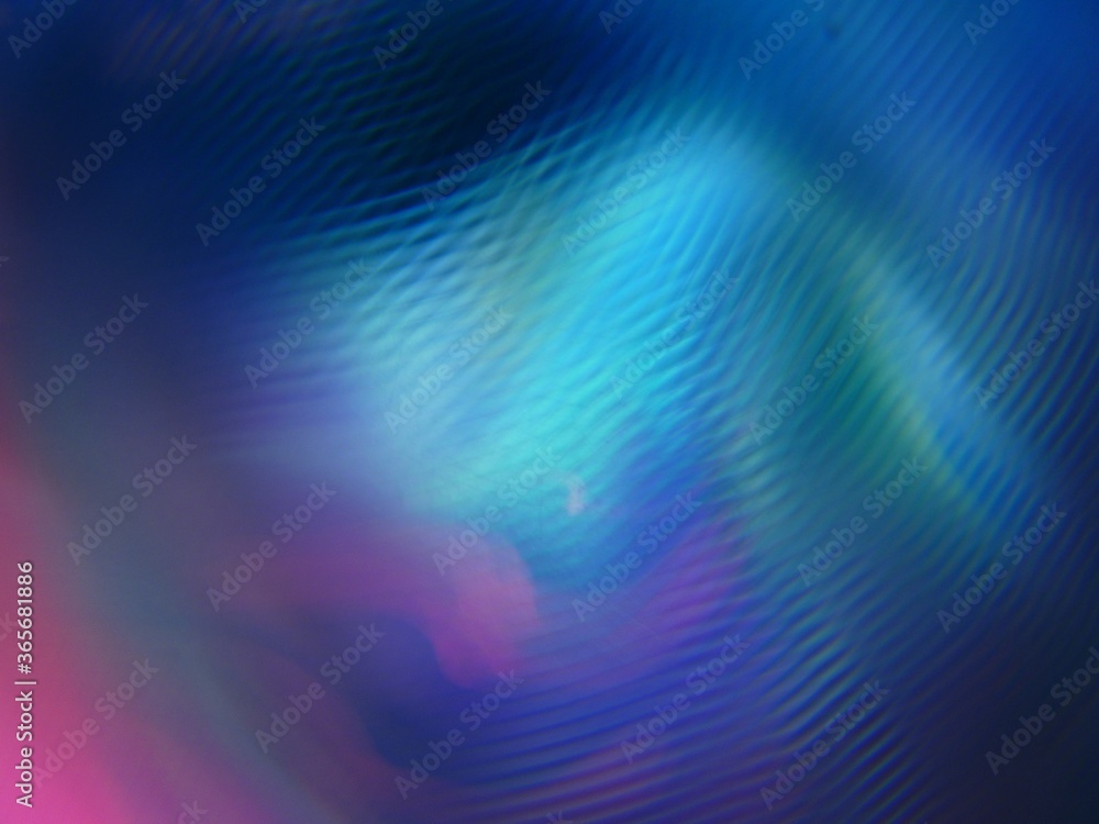 Poster mottled rotating abstract background with colorful light beams