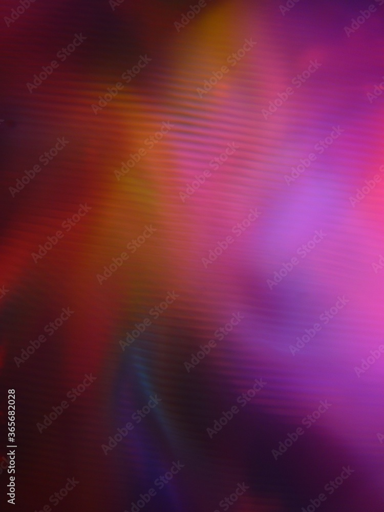 Poster mottled rotating abstract background with colorful light beams