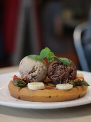 Ice Cream Waffles. Chocolate and Coffee Ice Cream on top of Waffle.