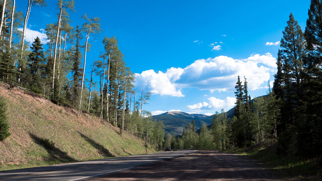 Road through Carson National Forest and the Sangre de Cristo Range of the Rocky Mountains, with Wheeler Peak in the distance