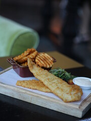 Fish and Chips. Barramundi Fish and Chips at a Cafe.