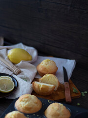 Lemon Muffins on Black Table with Copy Space. Lemon Cup Cakes Rustic Shot. Lemon Muffins Flatlay.