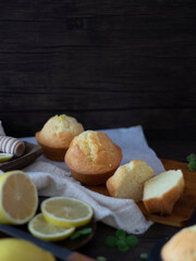 Lemon Muffins on Black Table with Copy Space. Lemon Cup Cakes Rustic Shot. Lemon Muffins Flatlay.