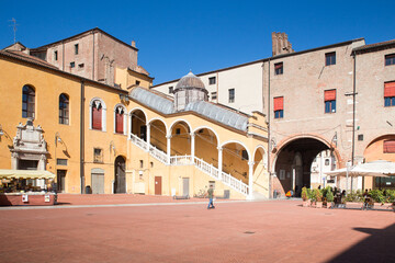 Fototapeta na wymiar Ferrara, Italy, town hall square in a summer sunny day