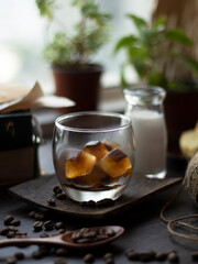 Espresso Cubes with Milk against Rustic Background. Coffee Cubes With Milk.