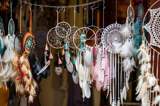 Fluffy variety of dream catchers on artisan street market of an old city Hoi An, Vietnam. Colorful dreamcatchers, closeup