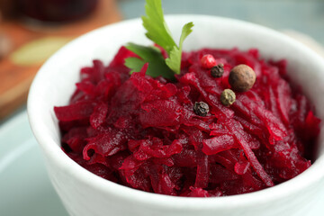 Delicious pickled beets in bowl, closeup view