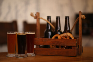 Obraz na płótnie Canvas Beer tasting set served on wooden table