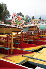 View of Xochimilco Canal boats on the river in the south of Mexico City, Mexico