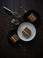 Coffee Chiffon Cake on Dark Background. Coffee Layer Cake on Black Table. Coffee Cake Flatlay. Mocha Sponge Cake