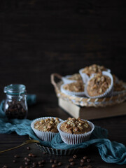 Still Life Coffee Muffins on Wooden Table. Coffee Muffins Flatlay on Dark Background. Mocha Muffins With Copy Space. Moody Food Photography Cup Cakes.