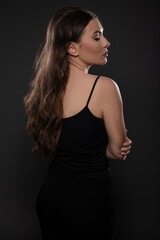 Beautiful girl posing on grey background. Isolated
Beauty session