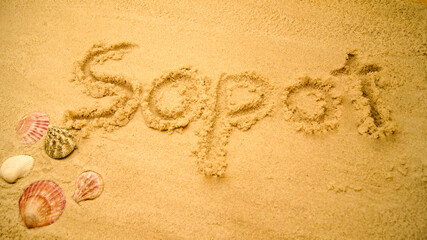 Fototapeta na wymiar Letters in sand on a beach | Holiday Composition for Sopot in Poland