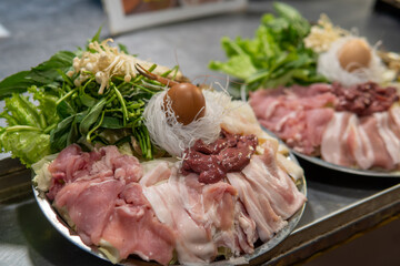 Plate of meat for sale at night Market in Northern Thailand