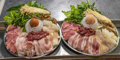 Plate of meat for sale at night Market in Northern Thailand