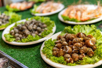 Mussels and Shrimp for sale at Night Market in Northern Thailand