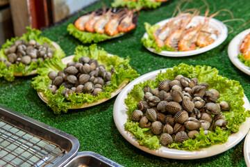 Mussels and Shrimp for sale at Night Market in Northern Thailand