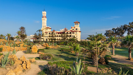Day shot of Montaza public park with Royal palace and Palestine Hotel at far end, Alexandria, Egypt