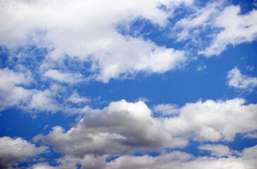 Naklejka na ściany i meble Blue summer sky background with clouds