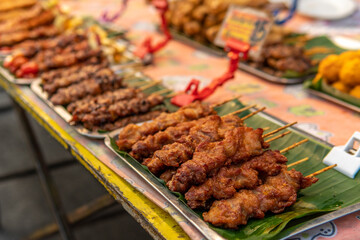 Meat on a stick at night market in Chiang Mai